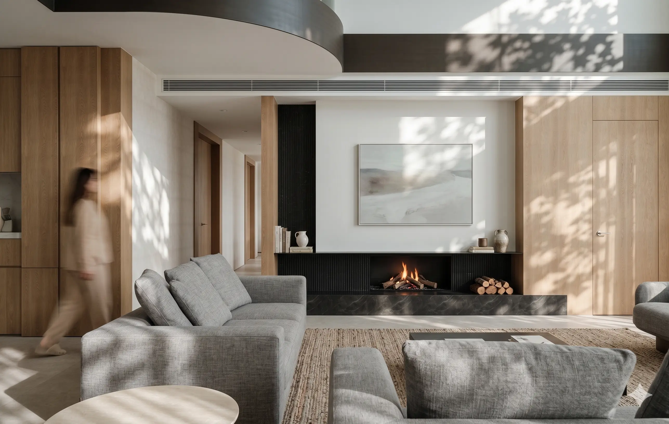 Minimalist luxury warm oak living room with custom cabinetry and grey furniture